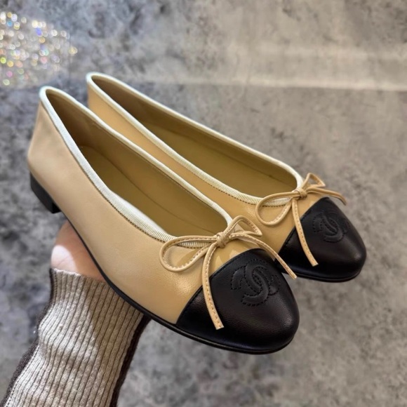 CHANEL Beige and Black Flats with Bow Accent - Picture 1 of 5